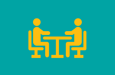 Yellow figure icon on a teal background, symbolizing stakeholder engagement or individuals involved in discussions