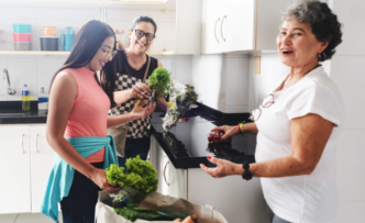 Family unpacking groceries together
